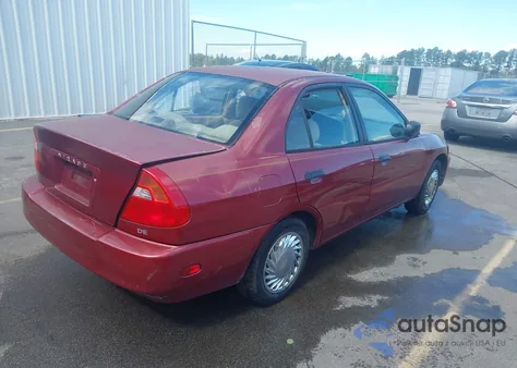2000 Mitsubishi Mirage De z USA, uszkodzony, nr VIN JA3AY26CXYU030328